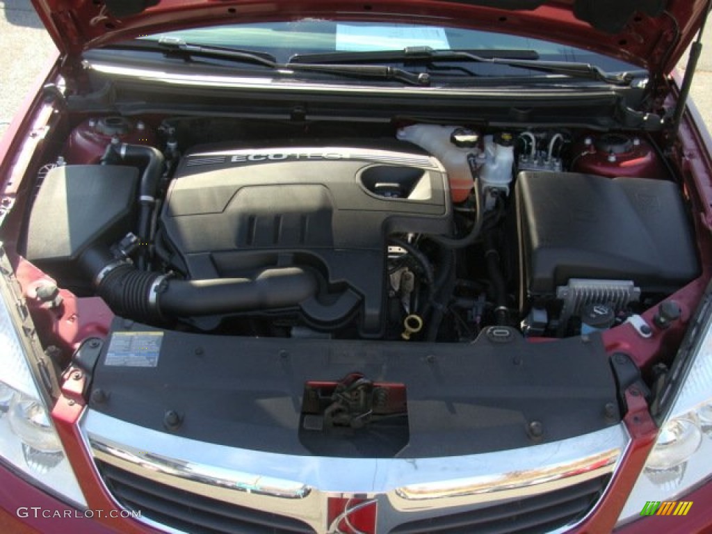 2009 Aura XE - Red Jewel Tintcoat / Tan photo #26