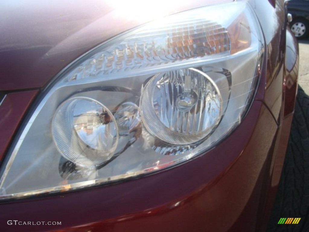 2009 Aura XE - Red Jewel Tintcoat / Tan photo #27