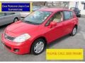 2007 Red Alert Nissan Versa S  photo #1