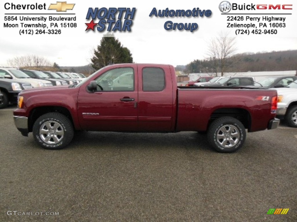2013 Sierra 1500 SLE Extended Cab 4x4 - Sonoma Red Metallic / Ebony photo #1