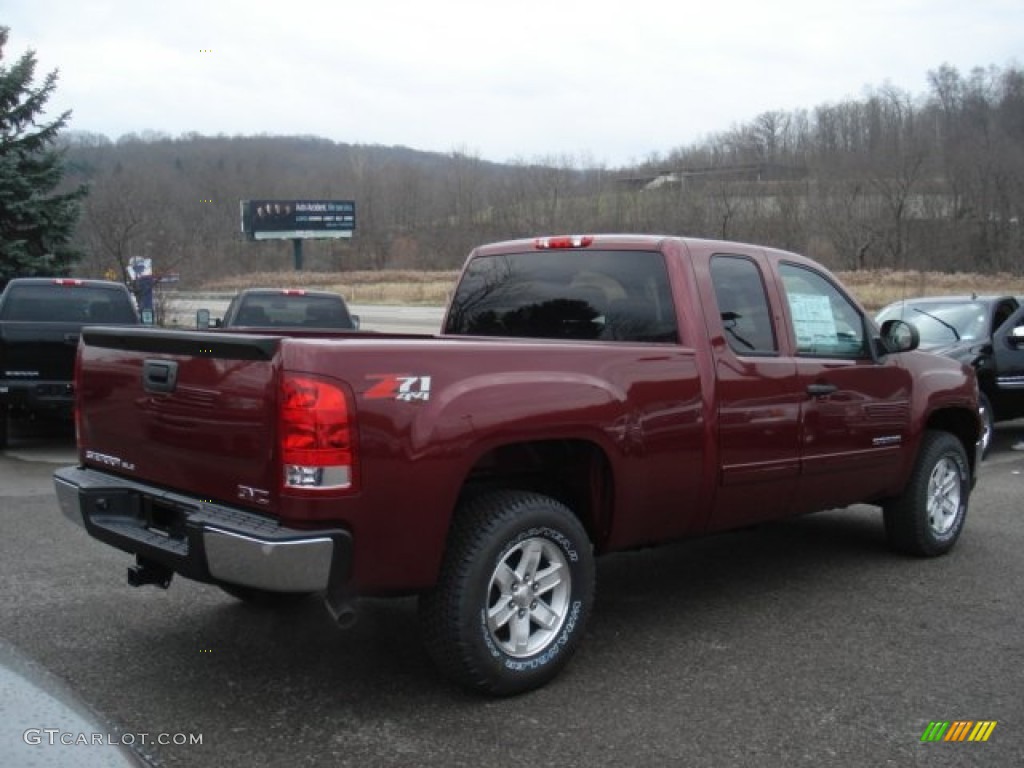 2013 Sierra 1500 SLE Extended Cab 4x4 - Sonoma Red Metallic / Ebony photo #6