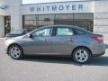 2013 Sterling Gray Ford Focus SE Sedan  photo #1