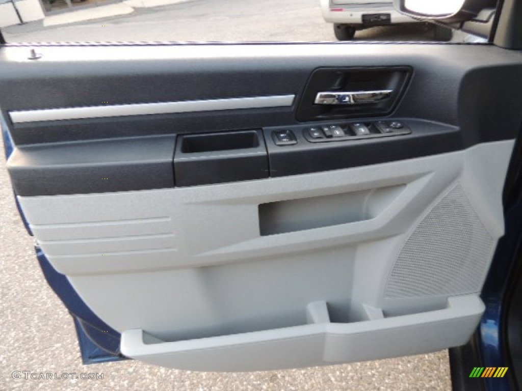 2010 Dodge Grand Caravan SE Dark Slate Gray/Light Shale Door Panel Photo #73912148