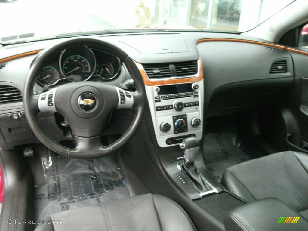 Ebony Interior 2009 Chevrolet Malibu LT Sedan Photo #74029830