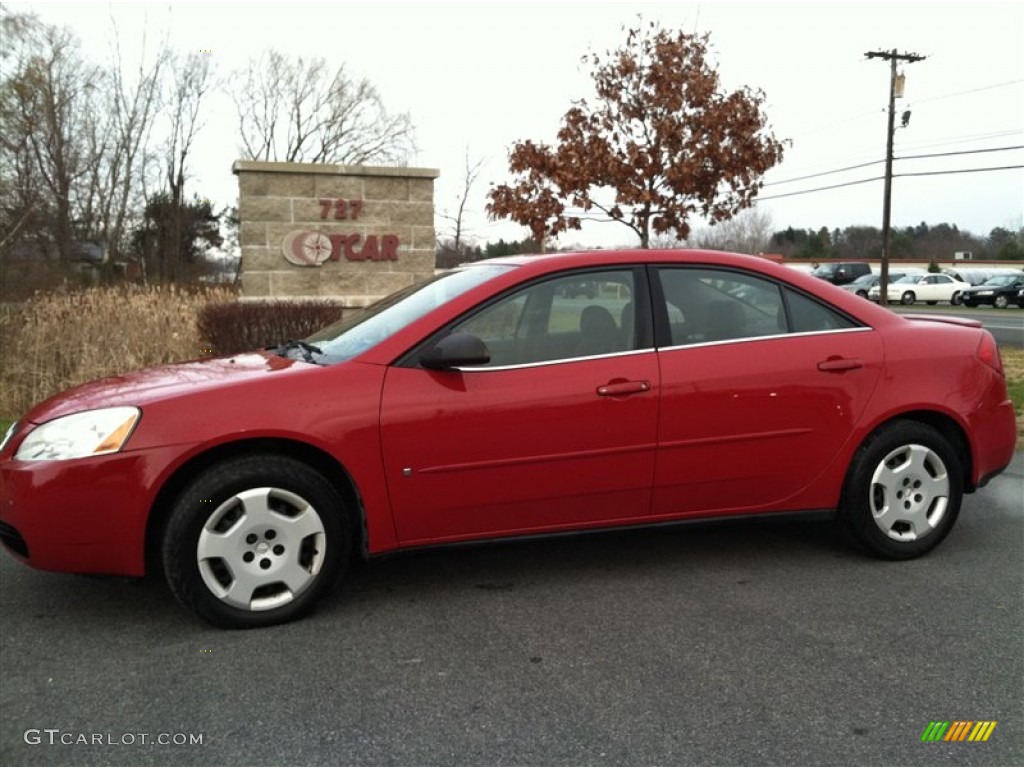 2006 G6 Sedan - Crimson Red / Ebony photo #1