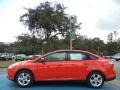 2013 Race Red Ford Focus SE Sedan  photo #2