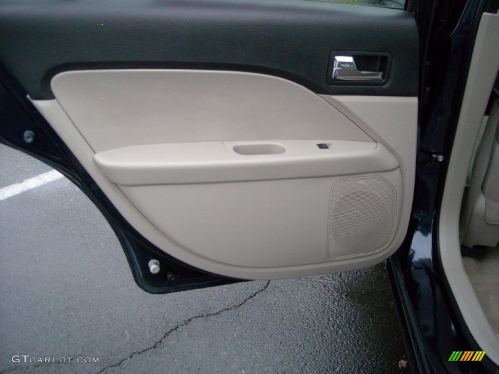 2009 Ford Fusion S Medium Light Stone Door Panel Photo #74129420