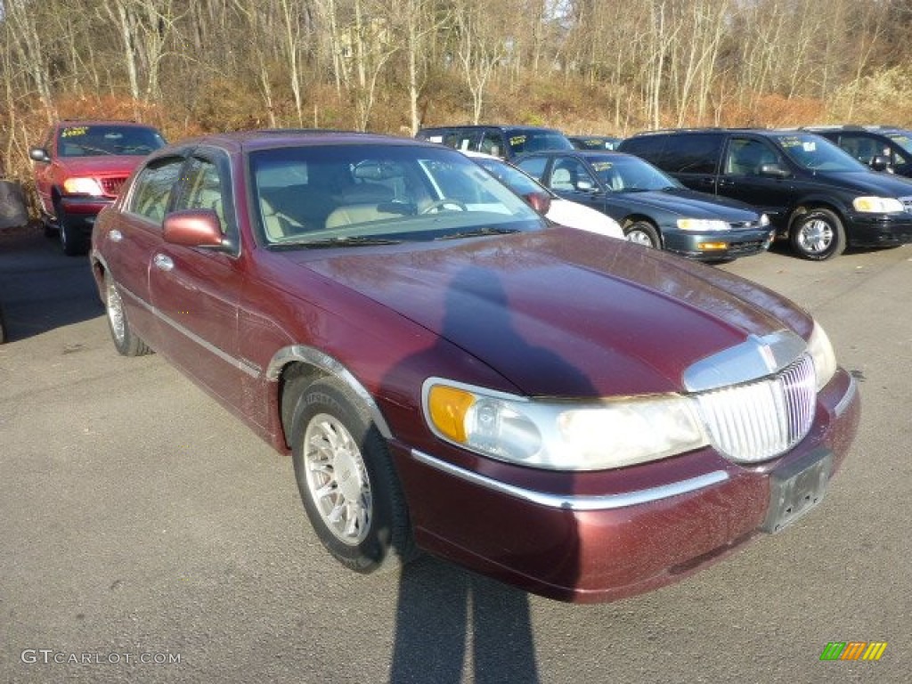 Autumn Red Metallic Lincoln Town Car