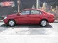 2004 Impulse Red Toyota Corolla LE  photo #1
