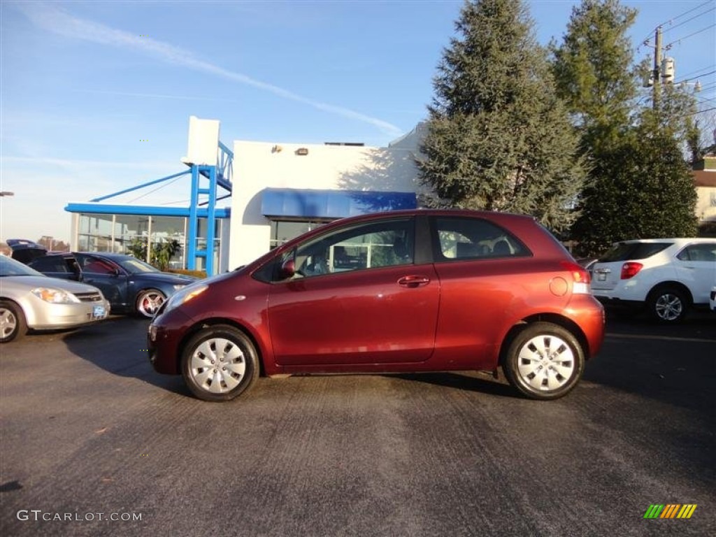 2009 Yaris 3 Door Liftback - Carmine Red Metallic / Dark Charcoal photo #1