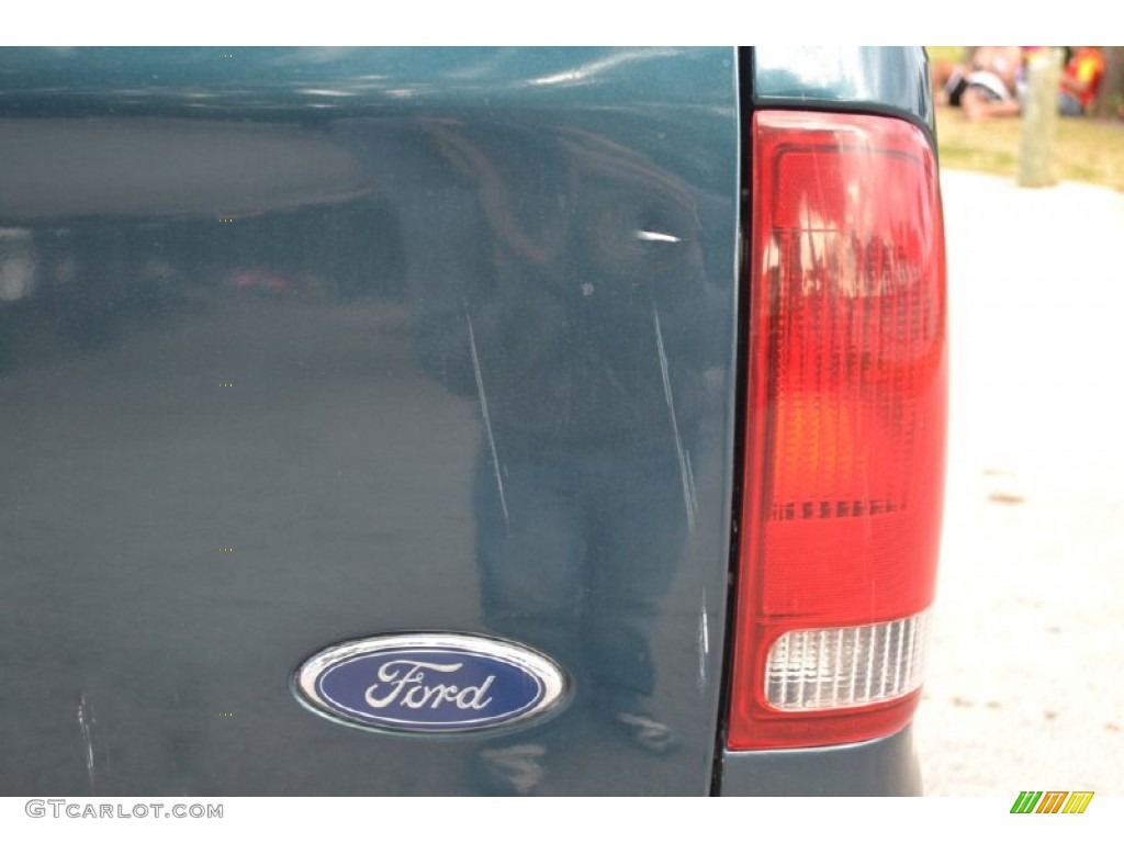 1999 F350 Super Duty Lariat SuperCab 4x4 - Dark Tourmaline Metallic / Medium Prairie Tan photo #24