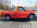 2003 Hugger Orange Ford F150 XLT Regular Cab  photo #5