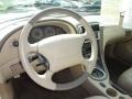Medium Parchment Steering Wheel Photo for 2003 Ford Mustang #74295479