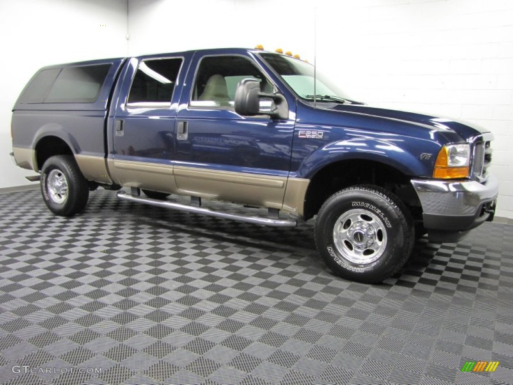 True Blue Metallic 2001 Ford F250 Super Duty Lariat Super Crew 4x4 Exterior Photo #74324378