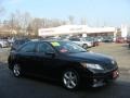 2010 Black Toyota Camry SE  photo #1