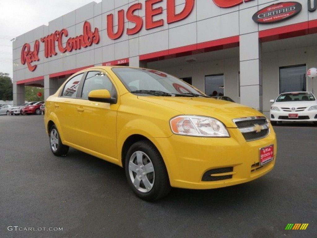 2011 Aveo LT Sedan - Summer Yellow / Charcoal photo #1