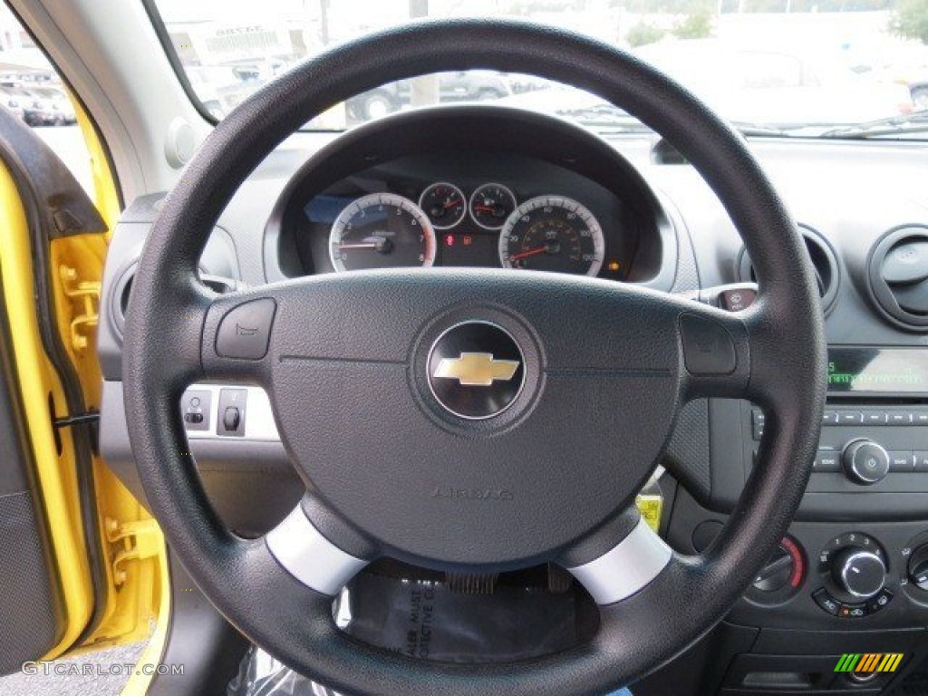 2011 Chevrolet Aveo LT Sedan Charcoal Steering Wheel Photo #74355844