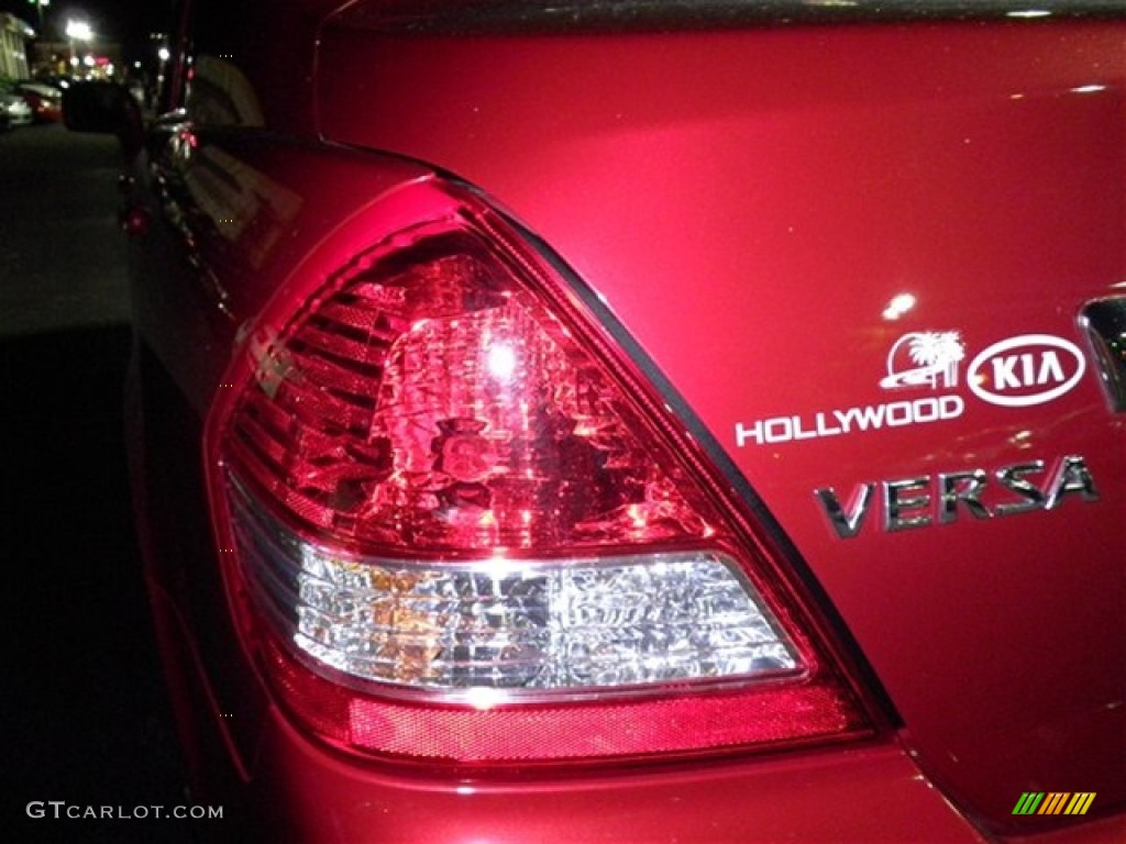 2011 Versa 1.8 S Sedan - Red Brick / Charcoal photo #12