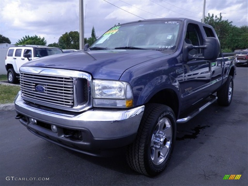 2004 F250 Super Duty XLT Crew Cab 4x4 - Medium Wedgewood Blue Metallic / Medium Flint photo #9