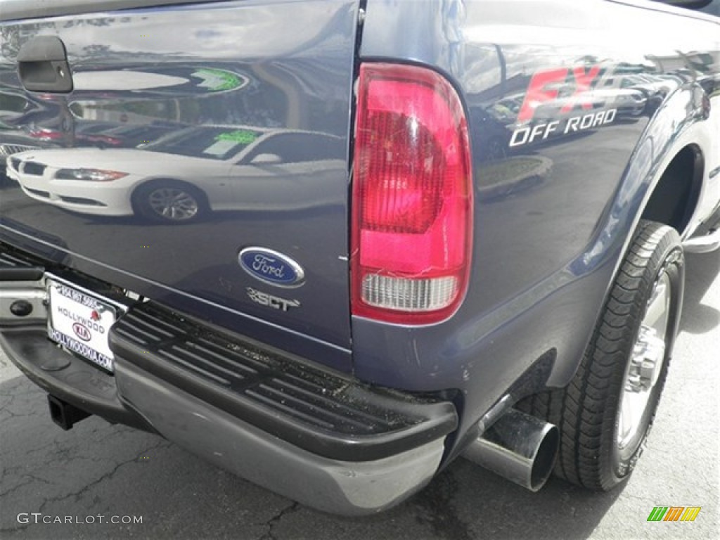 2004 F250 Super Duty XLT Crew Cab 4x4 - Medium Wedgewood Blue Metallic / Medium Flint photo #18