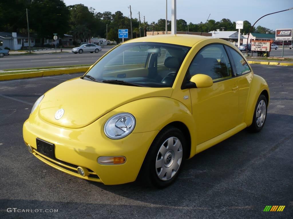 Double Yellow Volkswagen New Beetle