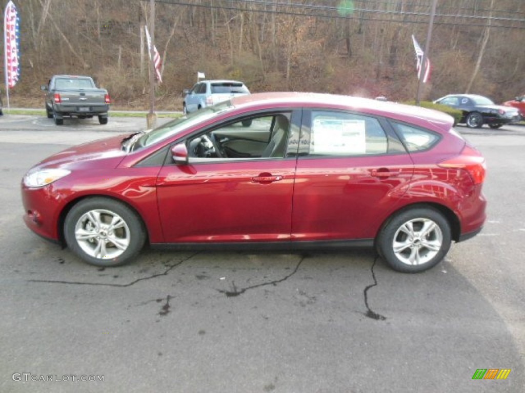 Ruby Red 2013 Ford Focus SE Hatchback Exterior Photo #74486474