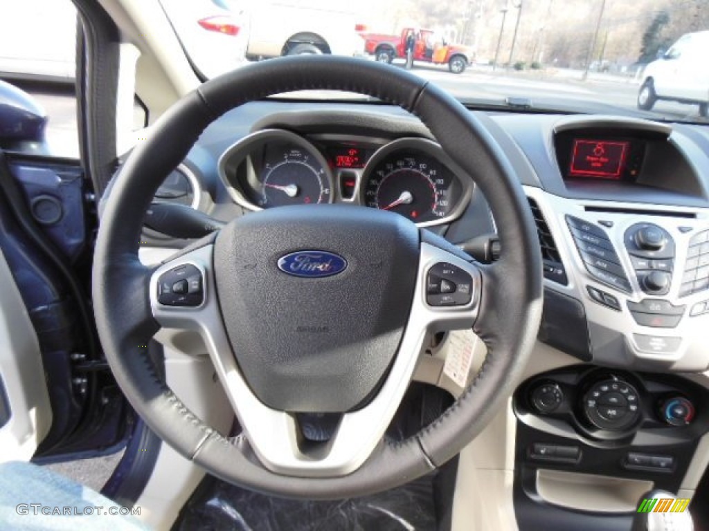 2013 Ford Fiesta SE Sedan Charcoal Black/Light Stone Steering Wheel Photo #74487872