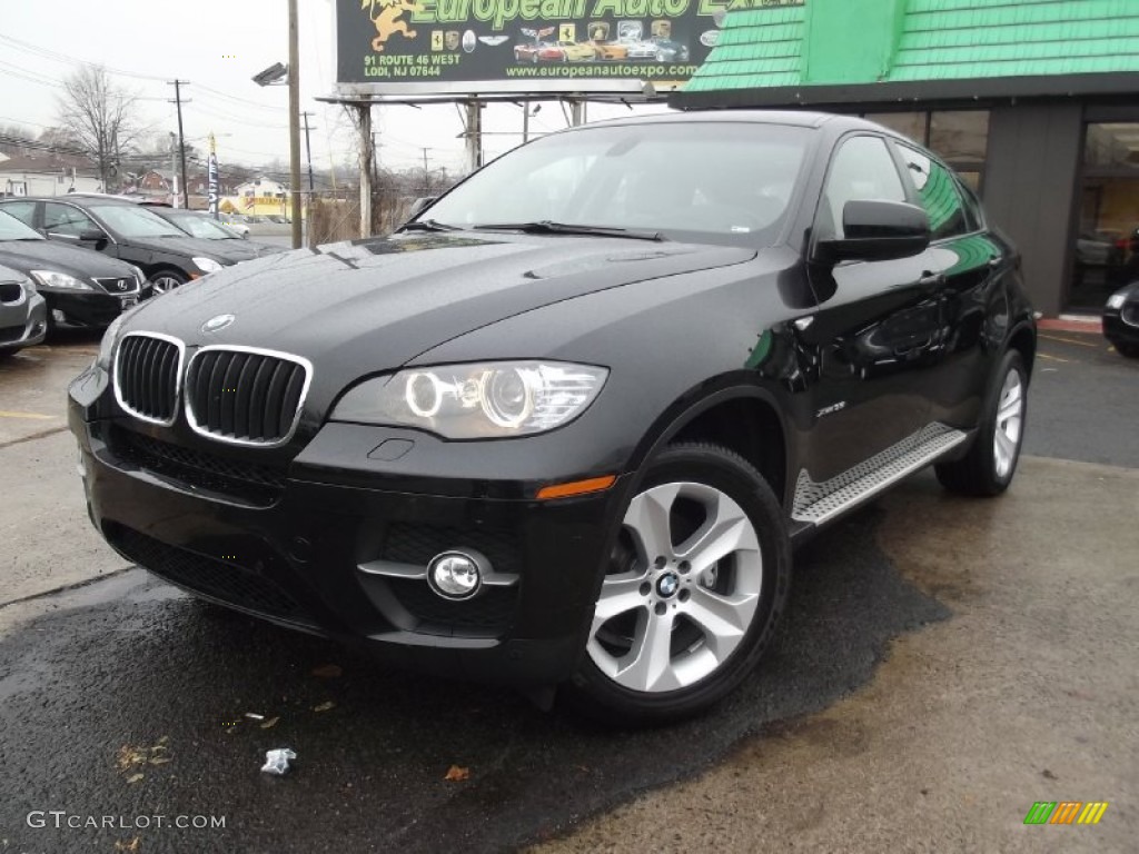 2011 X6 xDrive35i - Jet Black / Sand Beige photo #1