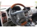 Tan Steering Wheel Photo for 2005 Mitsubishi Montero #74595808