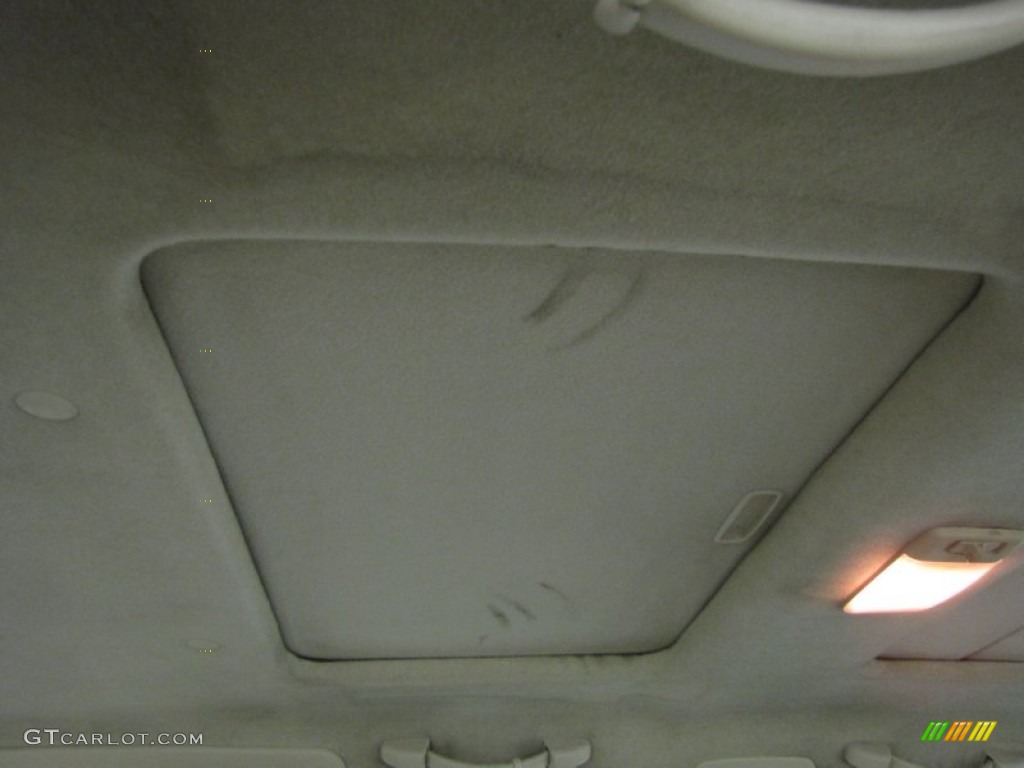 2001 Outback Limited Wagon - Winestone Red Pearl / Beige photo #28