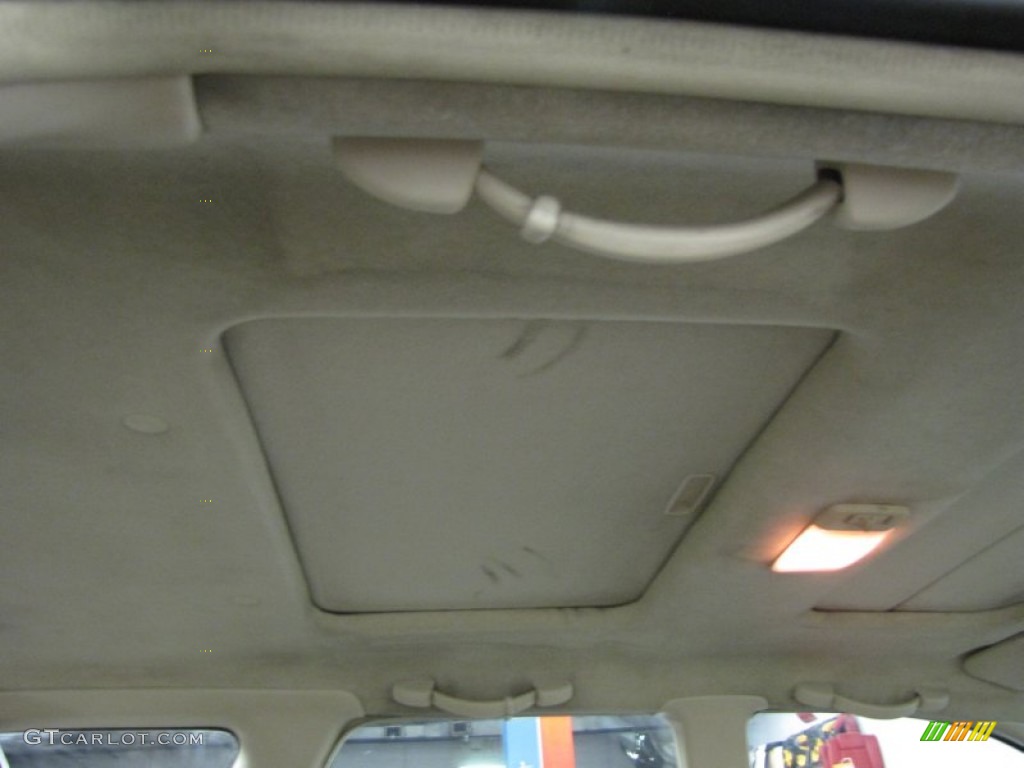 2001 Outback Limited Wagon - Winestone Red Pearl / Beige photo #29