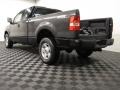 2004 Black Ford F150 STX SuperCab 4x4  photo #2