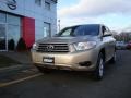 2010 Sandy Beach Metallic Toyota Highlander V6 4WD  photo #1