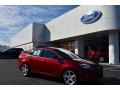 2013 Ruby Red Ford Focus Titanium Sedan  photo #1