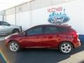 2013 Ruby Red Ford Focus SE Hatchback  photo #3
