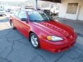 2004 Victory Red Pontiac Grand Am GT Coupe  photo #2