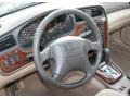 Beige 2003 Subaru Outback Wagon Steering Wheel