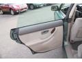 Beige 2003 Subaru Outback Wagon Door Panel