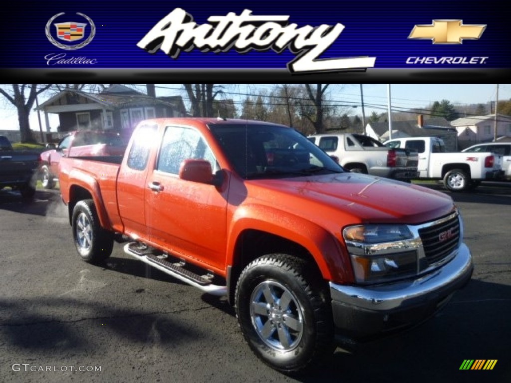 2012 Canyon SLE Extended Cab 4x4 - Red Orange Metallic / Ebony photo #1