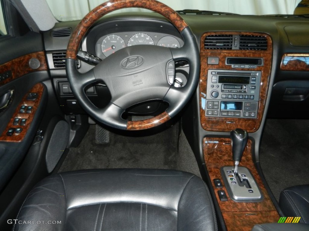 2003 XG350 Sedan - Black Obsidian / Black photo #10