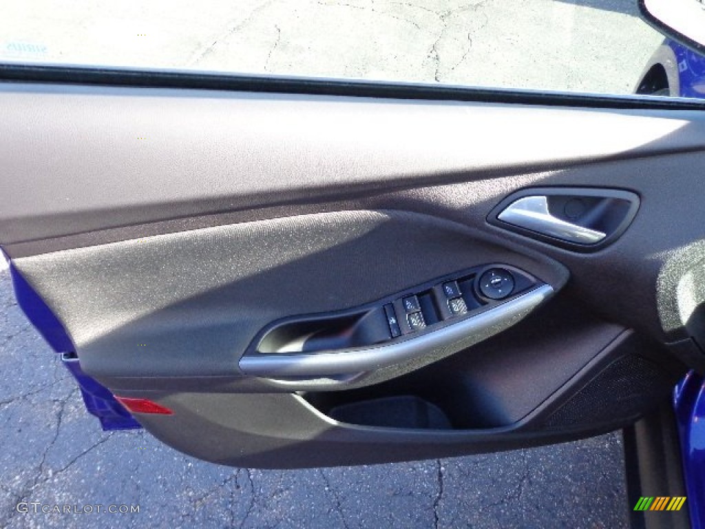 2013 Ford Focus Titanium Sedan Charcoal Black Door Panel Photo #74856473