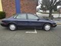 Deep Navy Blue Metallic 1999 Ford Taurus LX Exterior