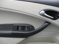 2005 Saab 9-3 Parchment Interior Door Panel Photo