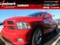 2011 Flame Red Dodge Ram 1500 Sport Quad Cab  photo #1