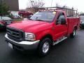 Red 2002 Ford F350 Super Duty XL Regular Cab Utility Truck