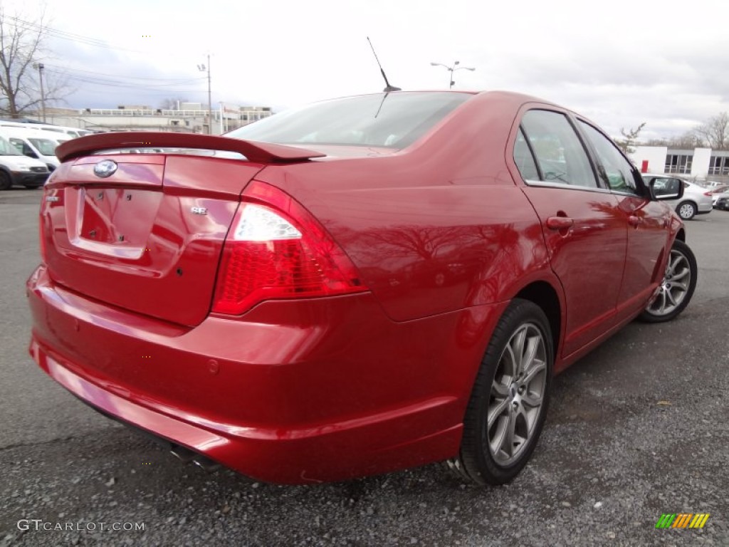 2010 Fusion SE - Red Candy Metallic / Medium Light Stone photo #5