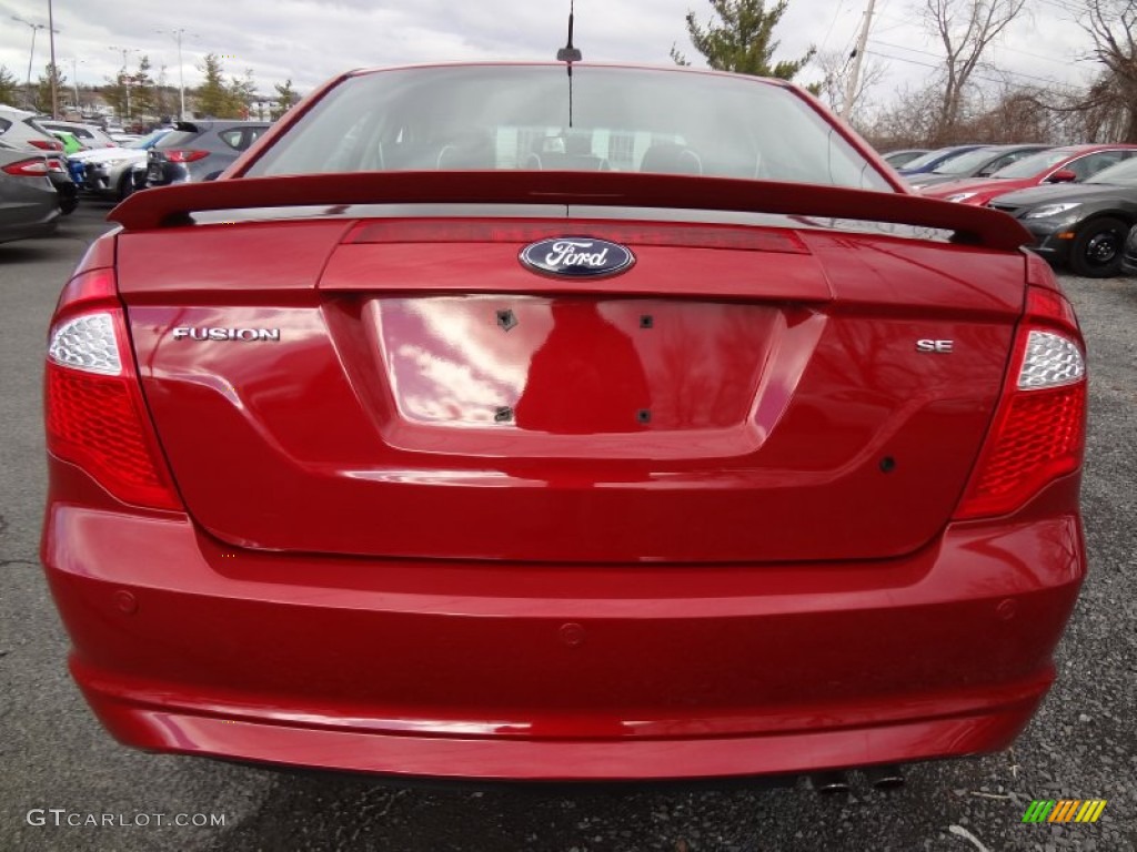 2010 Fusion SE - Red Candy Metallic / Medium Light Stone photo #6