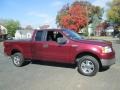 2005 Dark Toreador Red Metallic Ford F150 XLT SuperCab 4x4  photo #11