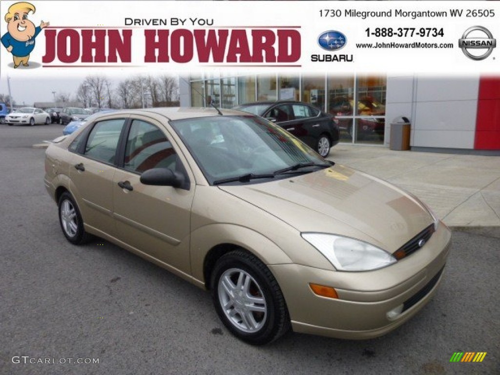 2001 Focus SE Sedan - Jackpot Gold Metallic / Medium Pebble photo #1