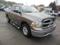 2010 Austin Tan Pearl Dodge Ram 1500 SLT Quad Cab  photo #1